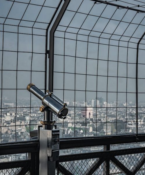free-photo-of-binoculars-on-the-eiffel-tower-overlooking-paris-france